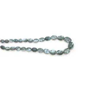 Blue Opal beads from India, polished blue gemstone beads arranged in a strand