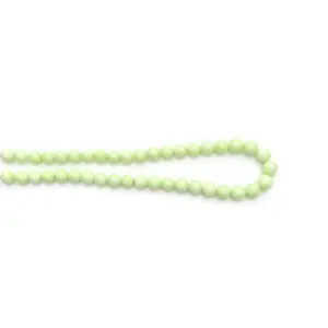 Gaspeite green gemstone beads from Australia, polished round strand