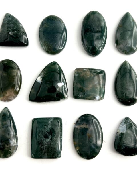 Flat Lay Showing Variety of Shape in the Moss Agate Mixed Shape Cabochons Approx 20 - 30mm 3 Piece Pack