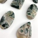 Angled Flat Lay of Tree Agate Pear Shape Top Drilled Cabochon Approx 35 - 40mm with 0.8mm Drill Hole 2