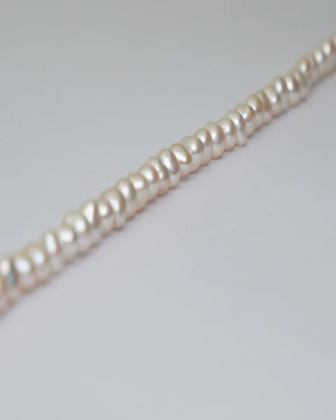 Freshwater Cultured Cream High Lustre Oval Approx 4.5 x 4mm 36cm String