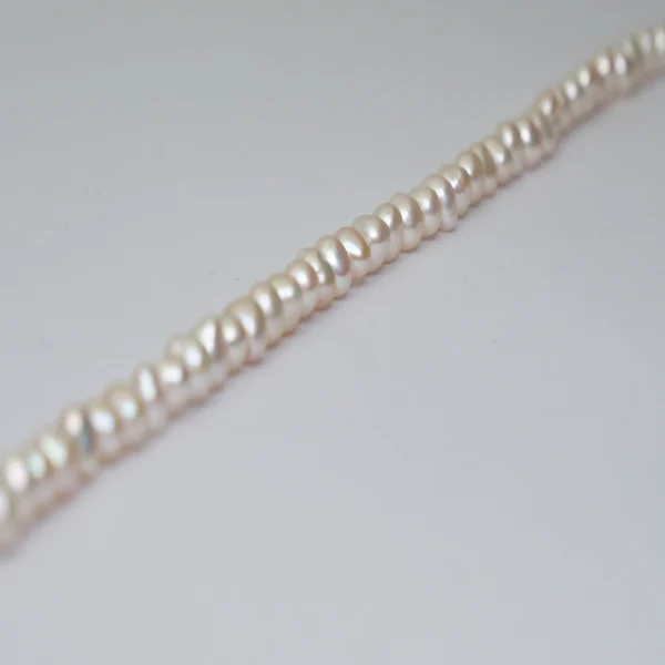 Freshwater Cultured Cream High Lustre Oval Approx 4.5 x 4mm 36cm String